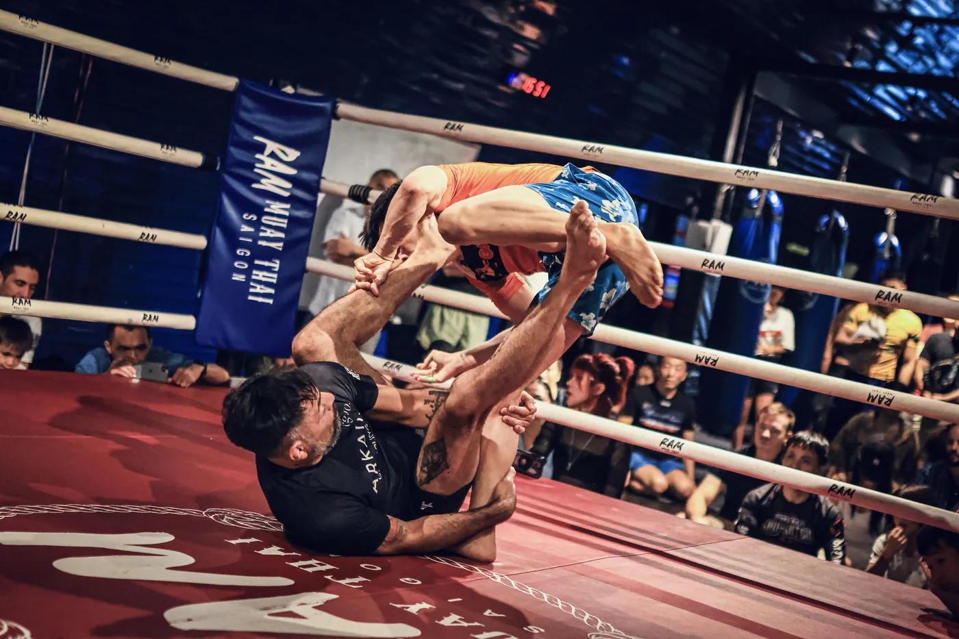 A grappling match inside the ring at Saigon Superfights