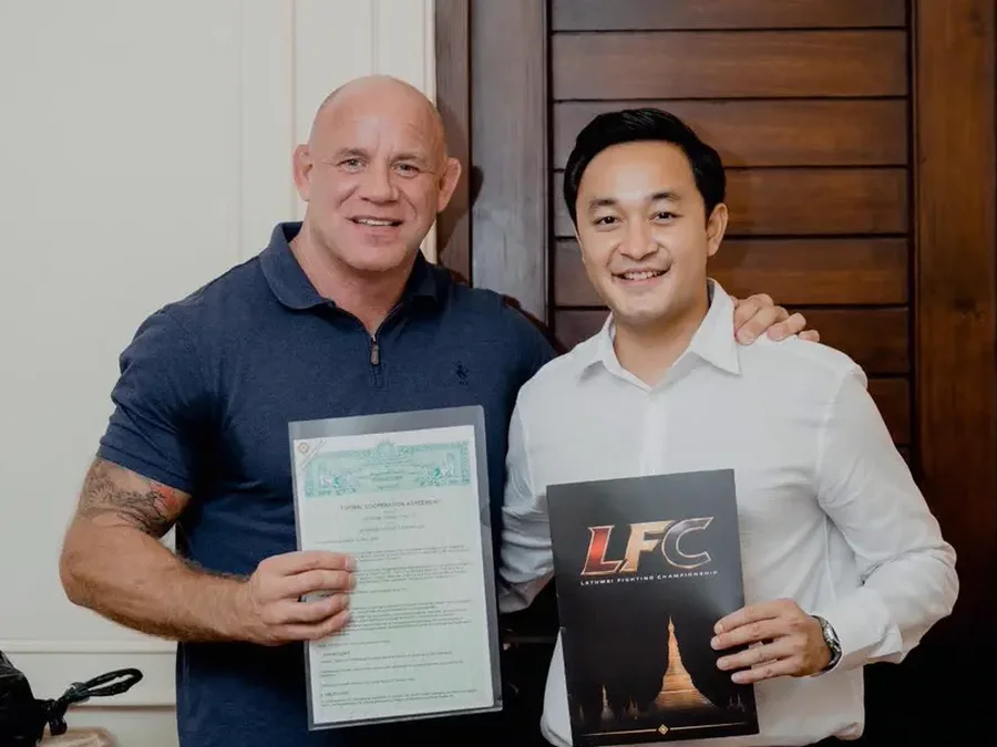 Nick Chapman (left) and LFC co-founder Min Wai Hin (Simon) with the Myanmar Lethwei Federation agreement. Photo: LFC