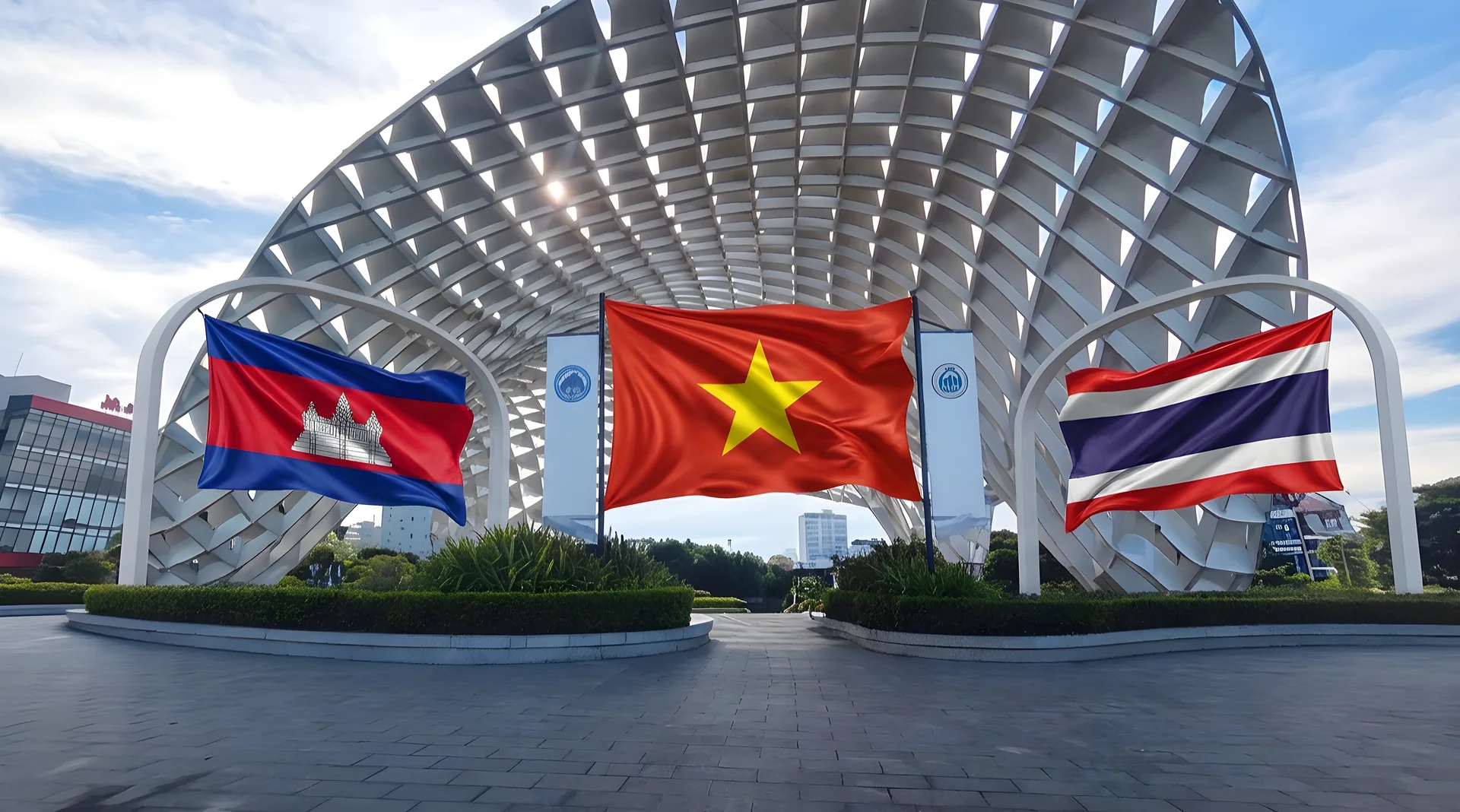 The flags of Cambodia, Vietnam and Thailand flying together under the canopy at APEC Park, Da Nang